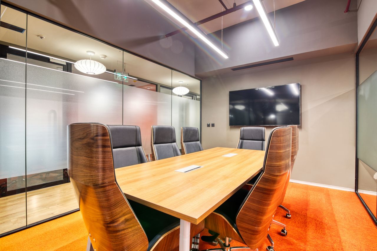 heros-img Sophisticated conference room with sleek furniture and glass walls. Ideal for business meetings.